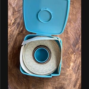 Tupperware blue sticker dispenser